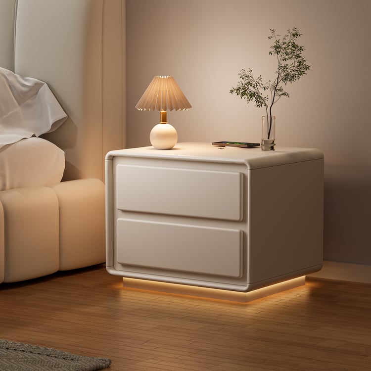 White nightstand in modern style, with 2-drawers, discreet LED and USB charging function – perfect for a stylish bedroom.